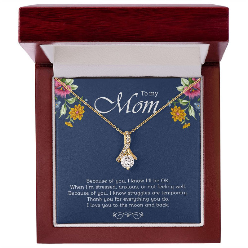 My Mom | Because Of You - Alluring Beauty NecklaceImagine her reaction when she opens this stunning gift! The Alluring Beauty necklace features a petite ribbon shaped pendant that is sure to dazzle your special someJewelryShineOn FulfillmentThe Everlasting Gift